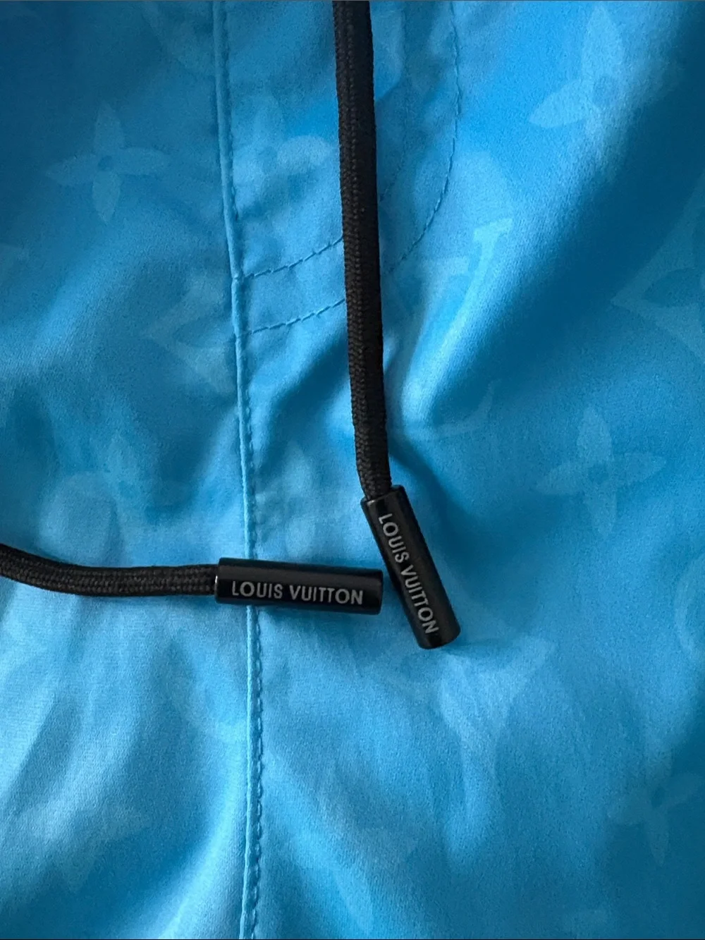 Louis Vuitton Men’s Sky Blue Monogram Swim Trunks with White Graphic